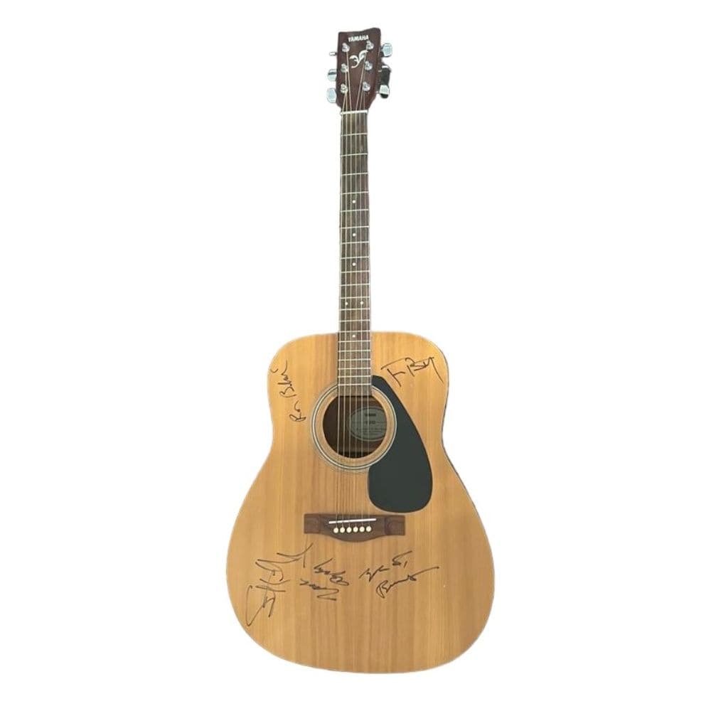 Tom Petty And The Heartbreakers Signed Yamaha Acoustic Guitar: This lot is an acoustic Yamaha guitar autographed by Tom Petty, Ron Blair, Benmont Tench, Stan Lynch and Mike Campbell of The Heartbreakers. Tom Petty and the Heartbreakers were an American rock band 