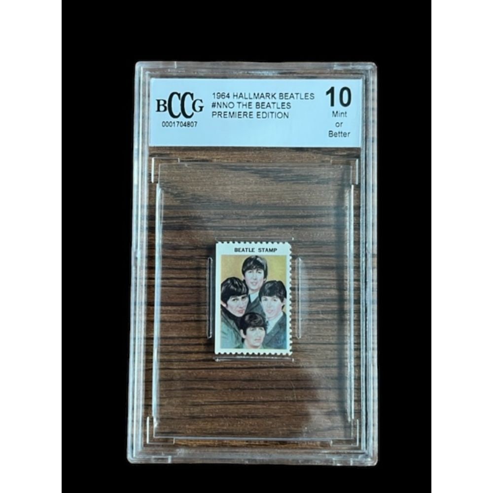 Beatles Beckett Stamp Graded 10.: This lot is a Beatles Beckett stamp graded 10. The Beatles were an English rock band, formed in Liverpool in 1960, that comprised John Lennon, Paul McCartney, George Harrison and Ringo Starr. They are