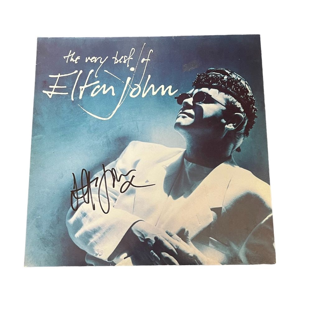 Elton John Signed Vinyl LP: This lot is a vinyl LP 'The Very Best Of Elton John' autographed by Elton John. Sir Elton Hercules John CH CBE is a British singer, pianist and composer. Commonly nicknamed the "Rocket Man" after his 
