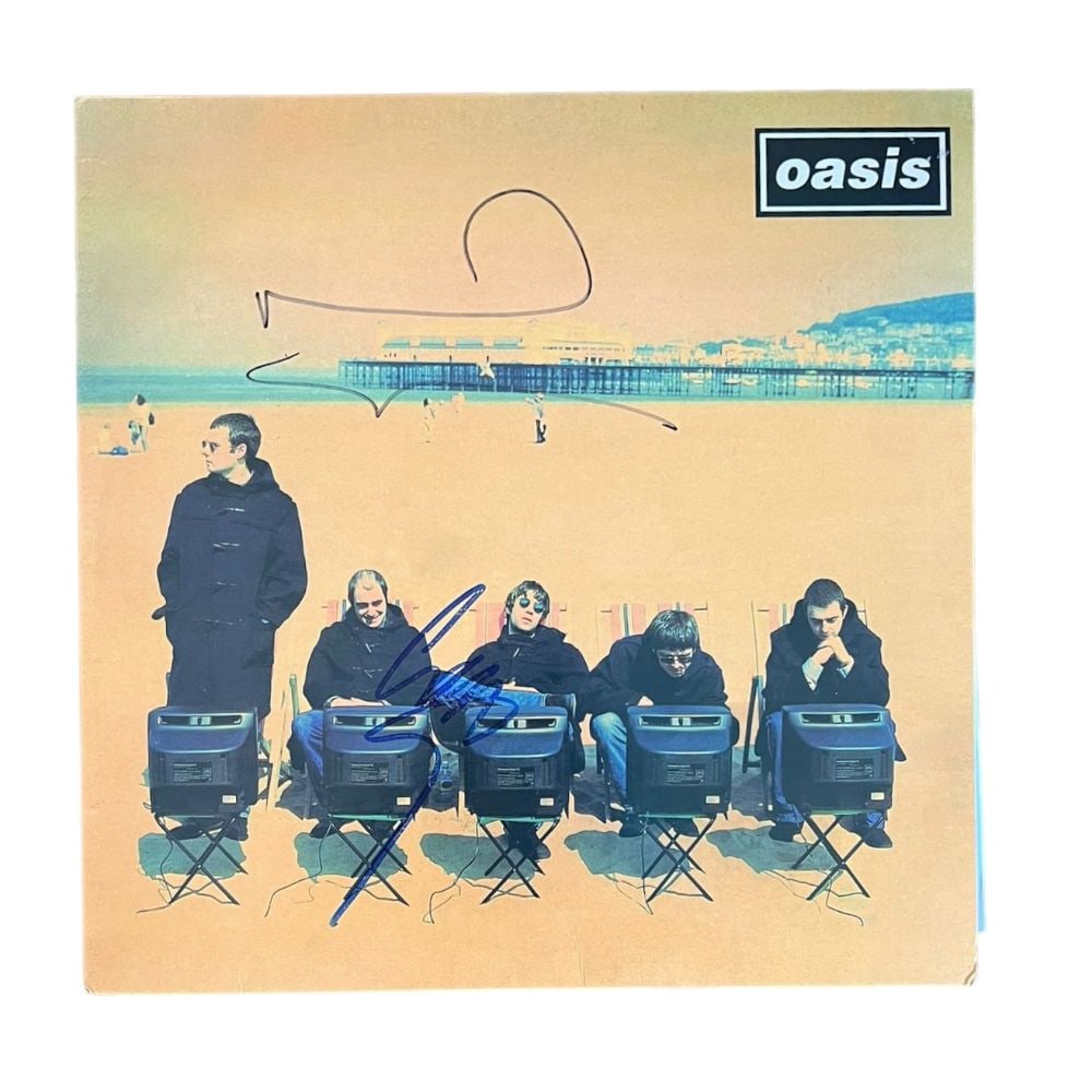 Oasis Signed Rare Roll With It 12" Vinyl EP Certified: This lot is a rare 12" vinyl EP of Oasis 'Roll With It' autographed on the front cover with sharpie pen by Noel Gallagher and Liam Gallagher of Oasis. Oasis were an English rock band formed in Manches