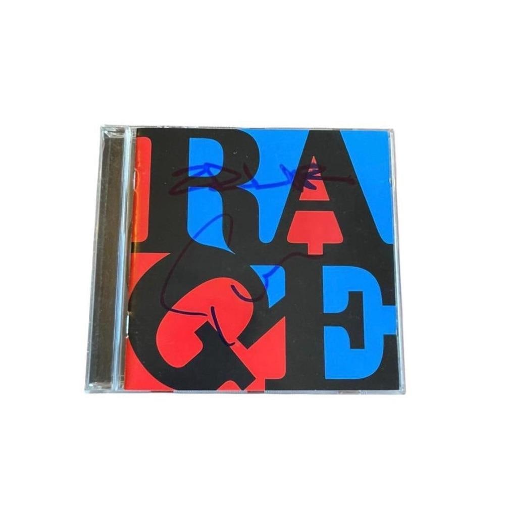 Rage Against The Machine Signed CD Certified: This lot is a CD (Renegades) autographed by Zack de la Rocha and Tom Morello of Rage Against The Machine. Item comes with Certificate of Authenticity, guaranteeing it for a lifetime.
