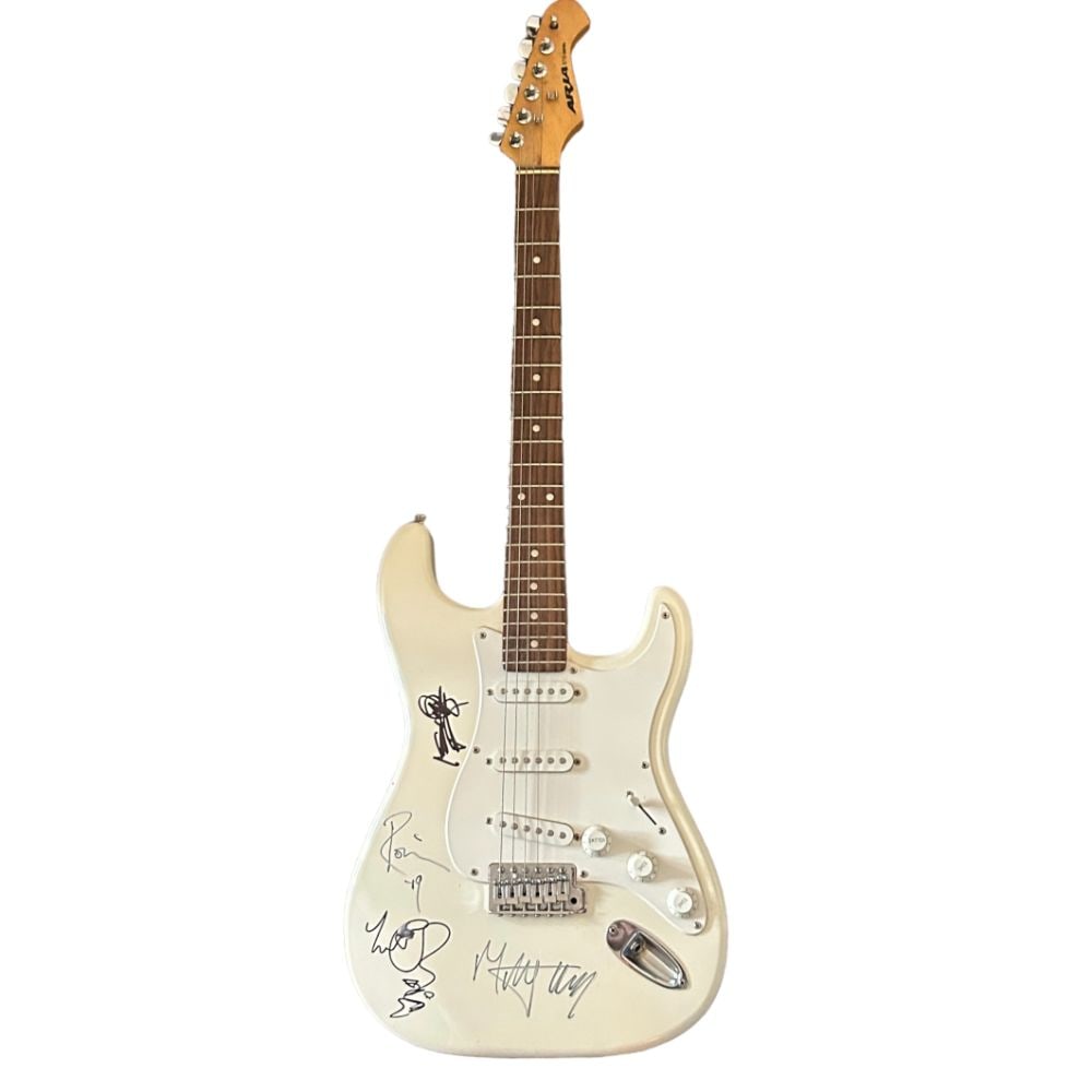 The Rolling Stones Fully Signed Electric Guitar: This lot is an Aria STG white electric guitar autographed on the body in black sharpie pen by Mick Jagger, Keith Richards, Ronnie Wood and Charlie Watts of The Rolling Stones