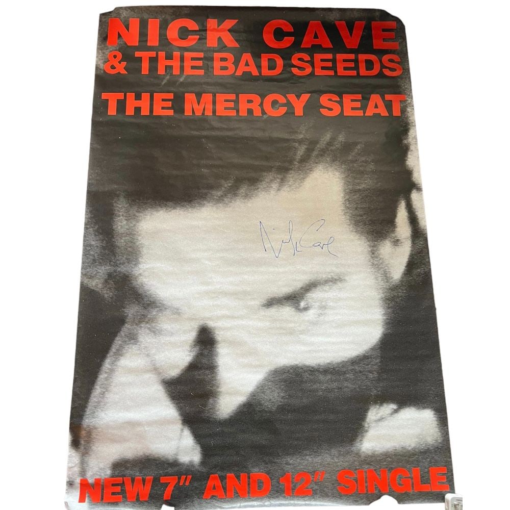Nick Cave Signed Huge Promotional Poster: This lot is an oversized promotional poster of Nick Cave and The Bad Seeeds 'The Mercy Seat' autographed by Nick Cave.