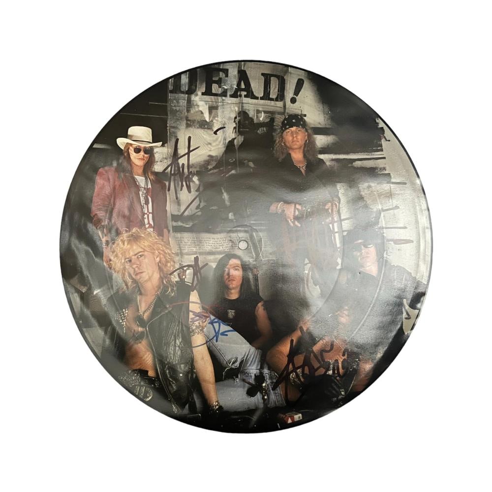 Guns N Roses Signed Use Your Illusion Picture Disc: This lot is a Use Your Illusion picture disc, autographed by Axl Rose, Slash, Duff McKagan, Dizzy Reed and Matt Sorum of Guns N Roses. Item comes with Certificate of Authenticity, guaranteeing it for