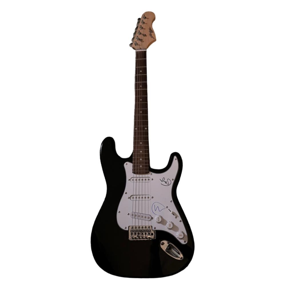 Eric Clapton & Steve WinwoodSigned Electric Guitar: This lot is an electric guitar autographed on scratchplate by Eric Clapton and Steve Winwood. Item comes with Certificate of Authenticity, guaranteeing it for a lifetime.