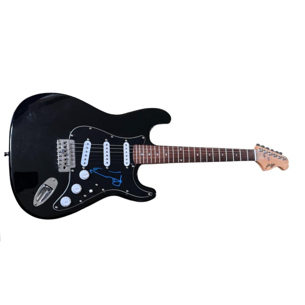 Paul McCartney Signed Electric Guitar: This lot is an Electric guitar autographed on the scratchplate by Sir Paul McCartney. Item comes with Certificate of Authenticity, guaranteeing it for a lifetime.