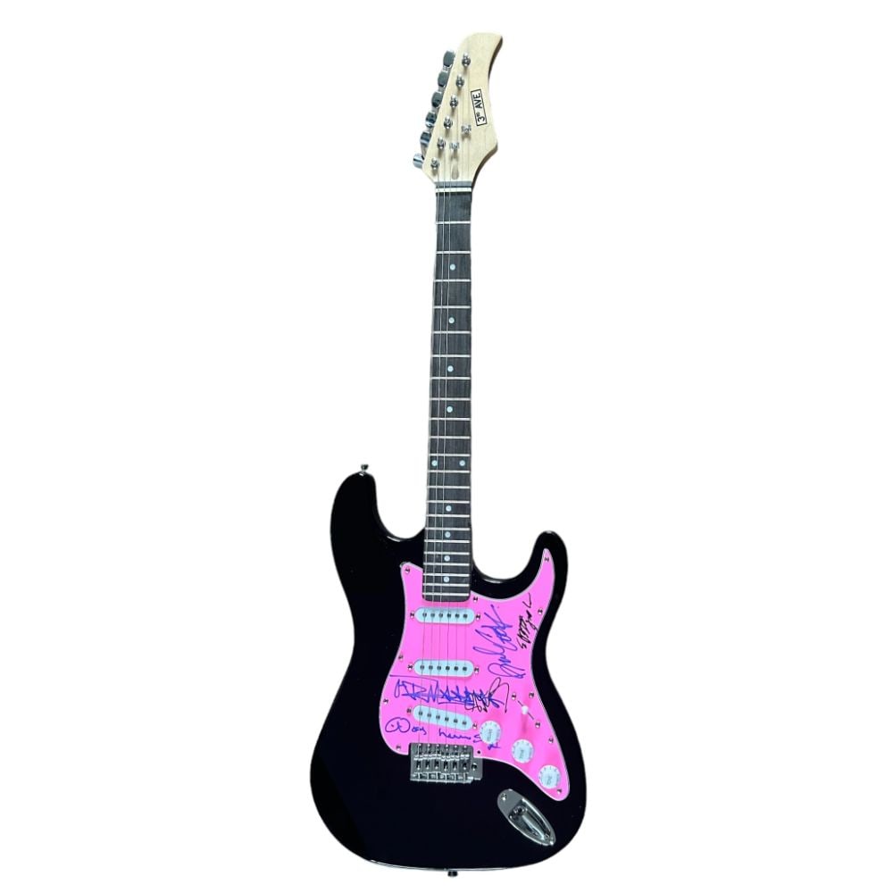 The Sex Pistols Signed Electric Guitar: This lot is a black Stratocaster style guitar autographed on a pink pickguard by Johnny Rotten, Paul Cook, Glen Matlock and Steve Jones of The Sex Pistols. The Sex Pistols were an English punk rock ba
