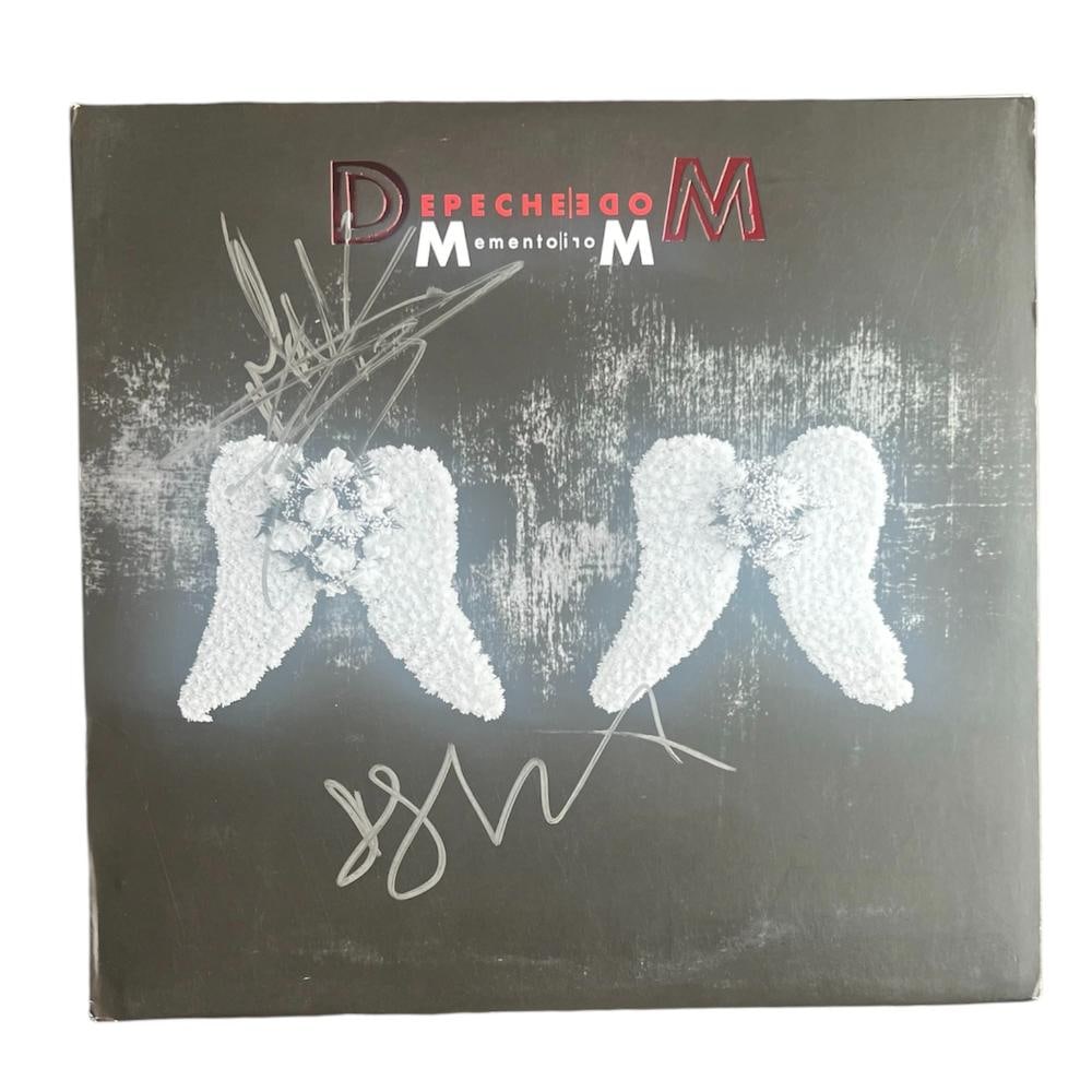 Depeche Mode Signed Vinyl LP: This lot is a vinyl LP (Memento Mori) autographed by Dave Gahan and Martin Gore of Depeche Mode. Item comes with Certificate of Authenticity, guaranteeing it for a lifetime.