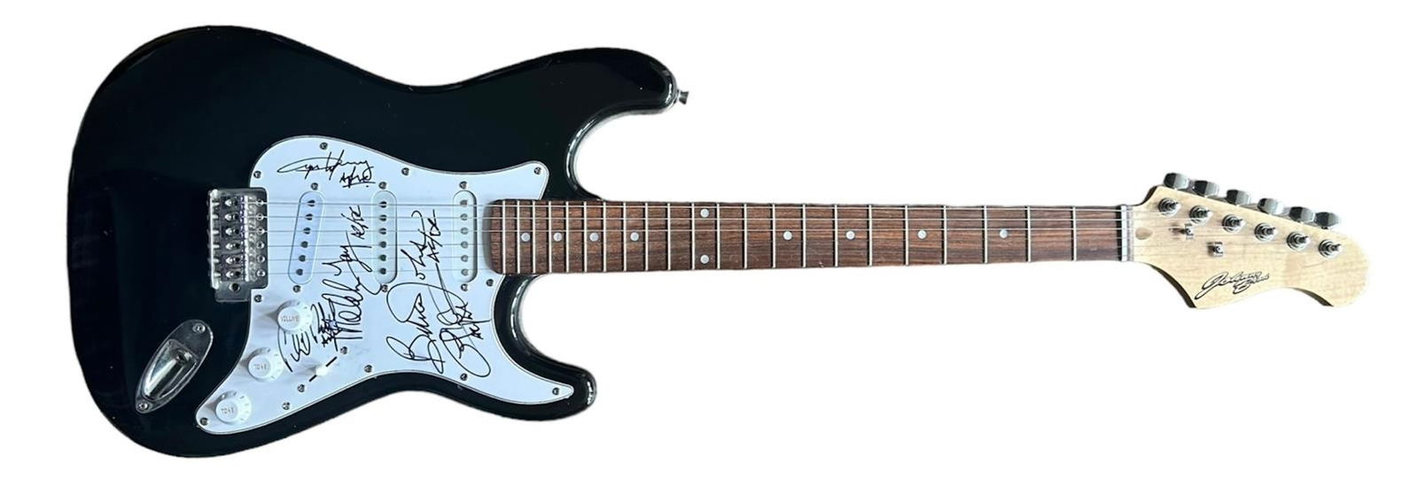 AC/DC Signed Electric Guitar: This lot is an electric guitar autographed by Brian Johnson, Angus Young, Malcolm Young, Cliff Williams and Phil Rudd of AC/DC. Item is authenticated by HSA and comes with affixed HSA Tamper-Proof hol