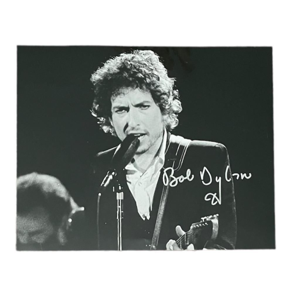 Bob Dylan Signed Photograph Certified: This lot is a 10'x8" photograph autographed by Bob Dylan. Item comes with Certificate of Authenticity, guaranteeing it for a lifetime.