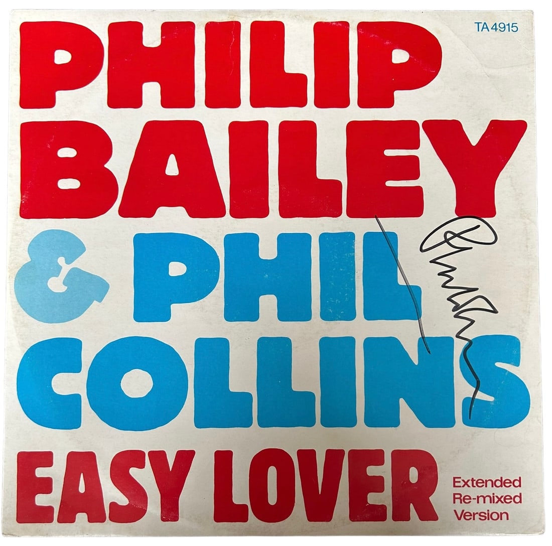 Phil Collins Signed Easy Lover 12" Vinyl: This lot is a 12" vinyl (Easy Lover) autographed on the front cover in black sharpie pen by Phil Collins. Item comes with Certificate of Authenticity, guaranteeing it for a lifetime.