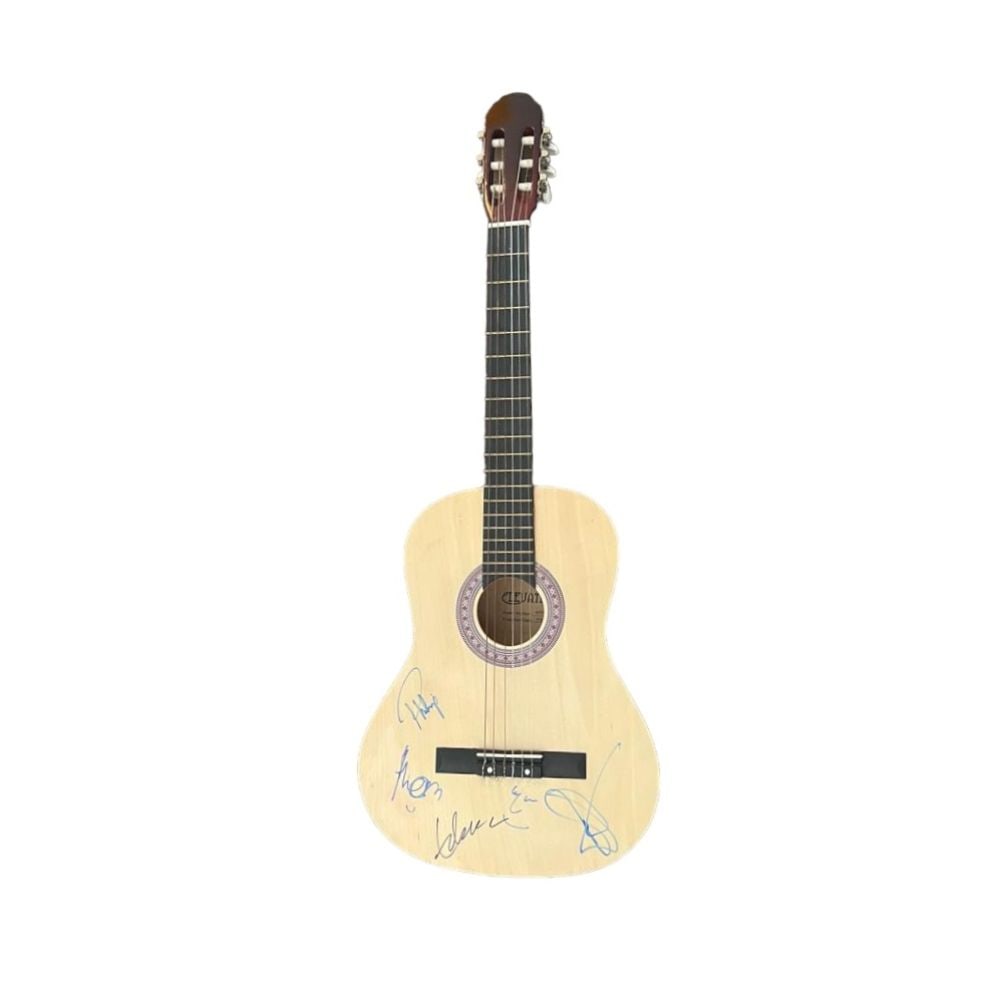 Radiohead Signed Acoustic Guitar: This lot is an acoustic guitar autographed on the body by Thom Yorke, Jonny Greenwood, Ed O'Brien, Phil Selway and Colin Greenwood of Radiohead. Radiohead are an English rock band formed in Abingdon,