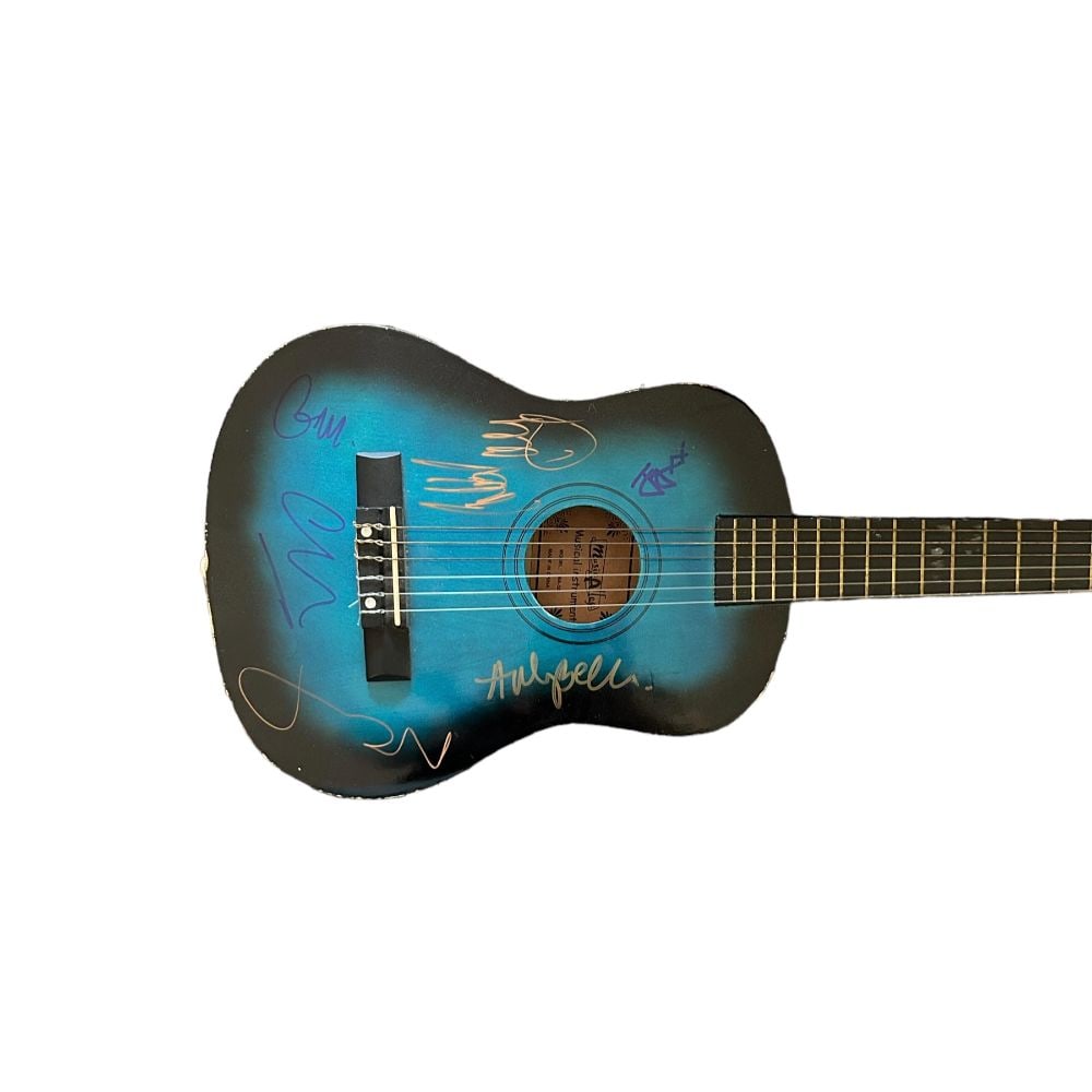 Oasis Signed Mini Acoustic Guitar: This lot is a mini acoustic guitar autographed by Noel Gallagher, Liam Gallagher, Gem Archer, Andy Bell, Chris Sharrock and Jay Darlington of Oasis. Item comes with Certificate of Authenticity, guaran