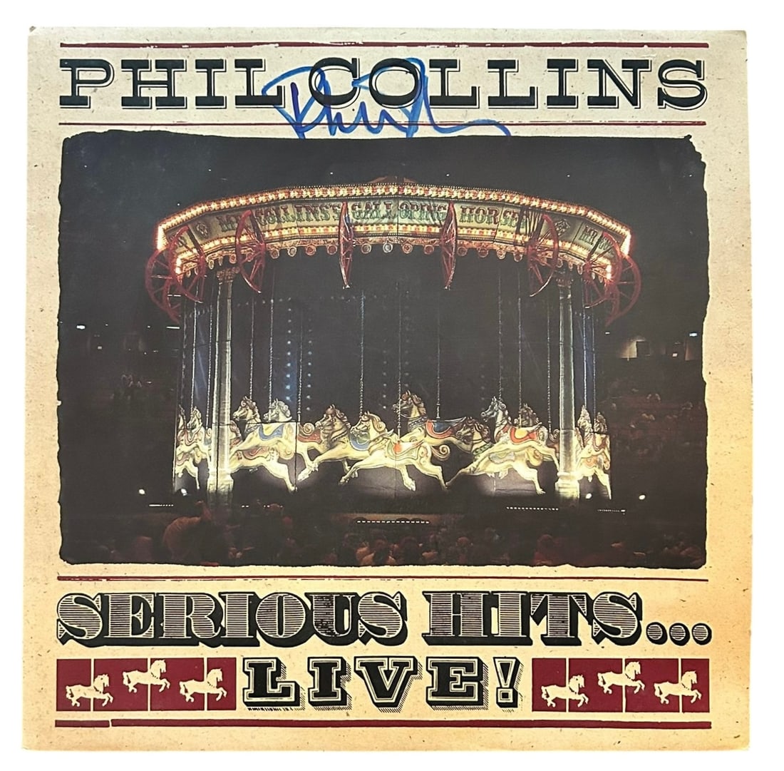 Phil Collins Signed Serious Hits Live Vinyl LP: This lot is a vinyl LP (Serious Hits Live) autographed on the front cover in blue sharpie pen by Phil Collins. Item comes with Certificate of Authenticity, guaranteeing it for a lifetime.
