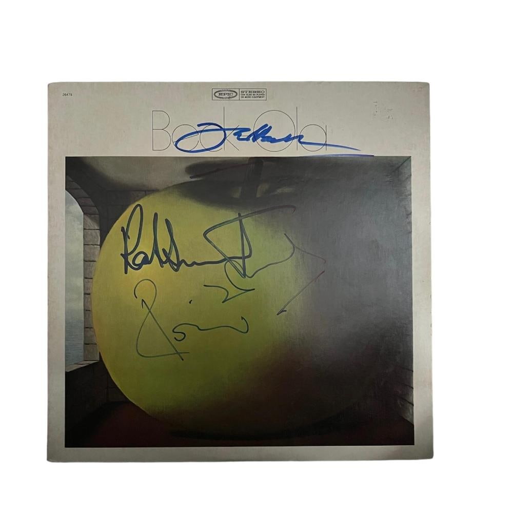 Jeff Beck Ronnie Wood & Rod Stewart Signed Beck Ola Vinyl LP: This lot is a vinyl LP Beck Ola autographed by Rod Stewart, Ronnie Wood and Jeff Beck. Item comes with Certificate of Authenticity, guaranteeing it for a lifetime.