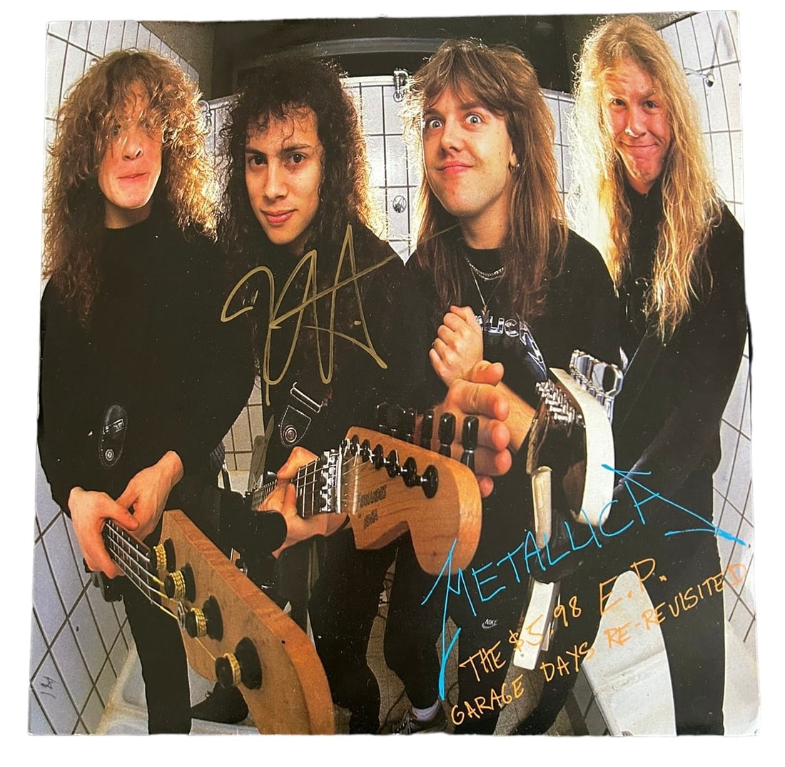Kirk Hammett Signed Garage Days Re-Revisited Vinyl LP: This lot is a vinyl LP (The $5.98 E.P. – Garage Days Re-Revisited) autographed on the front cover in gold sharpie pen by Kirk Hammett of Metallica. Item comes with Certificate of Authenticity, guara