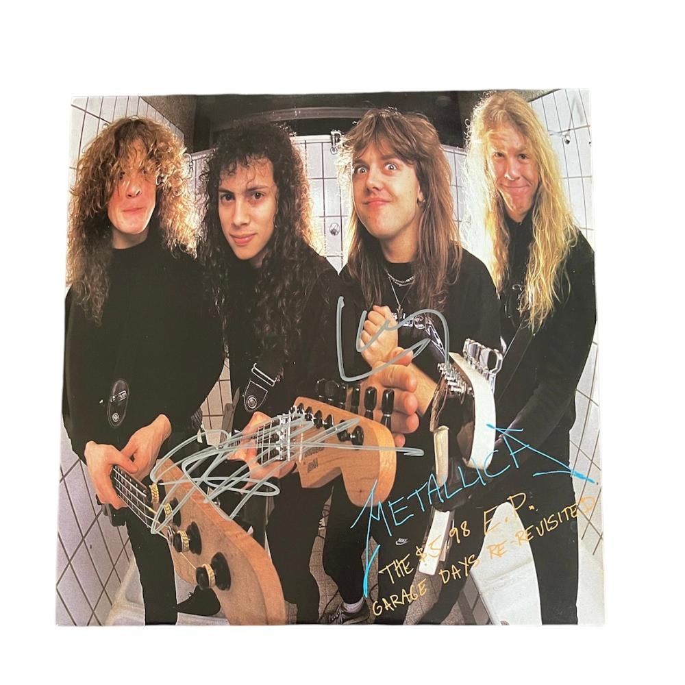 Metallica Signed Garage Days Revisited Vinyl LP: This lot is a vinyl LP (Garage Days Revisited) autographed by Kirk Hammett and Lars Ulrich of Metallica. Item comes with Certificate of Authenticity, guaranteeing it for a lifetime.