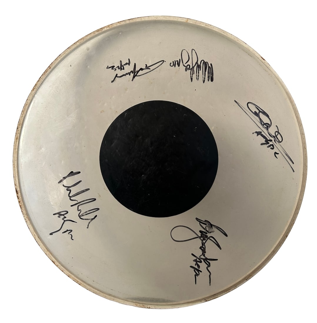 AC/DC Fully Signed Drumskin Certified: This lot is a drumskin autographed by Brian Johnson, Angus Young, Malcolm Young, Cliff Williams and Phil Rudd of AC/DC. Item comes with Certificate of Authenticity, guaranteeing it for a lifetime.