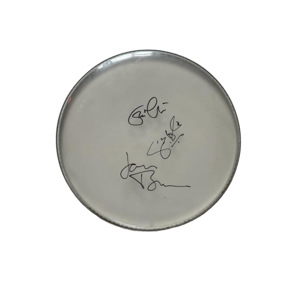 Eric Clapton Cream Signed Drumhead: This lot is a drumhead autographed by Eric Clapton, Ginger Baker and Jack Bruce of Cream. Item comes with Certificate of Authenticity, guaranteeing it for a lifetime.