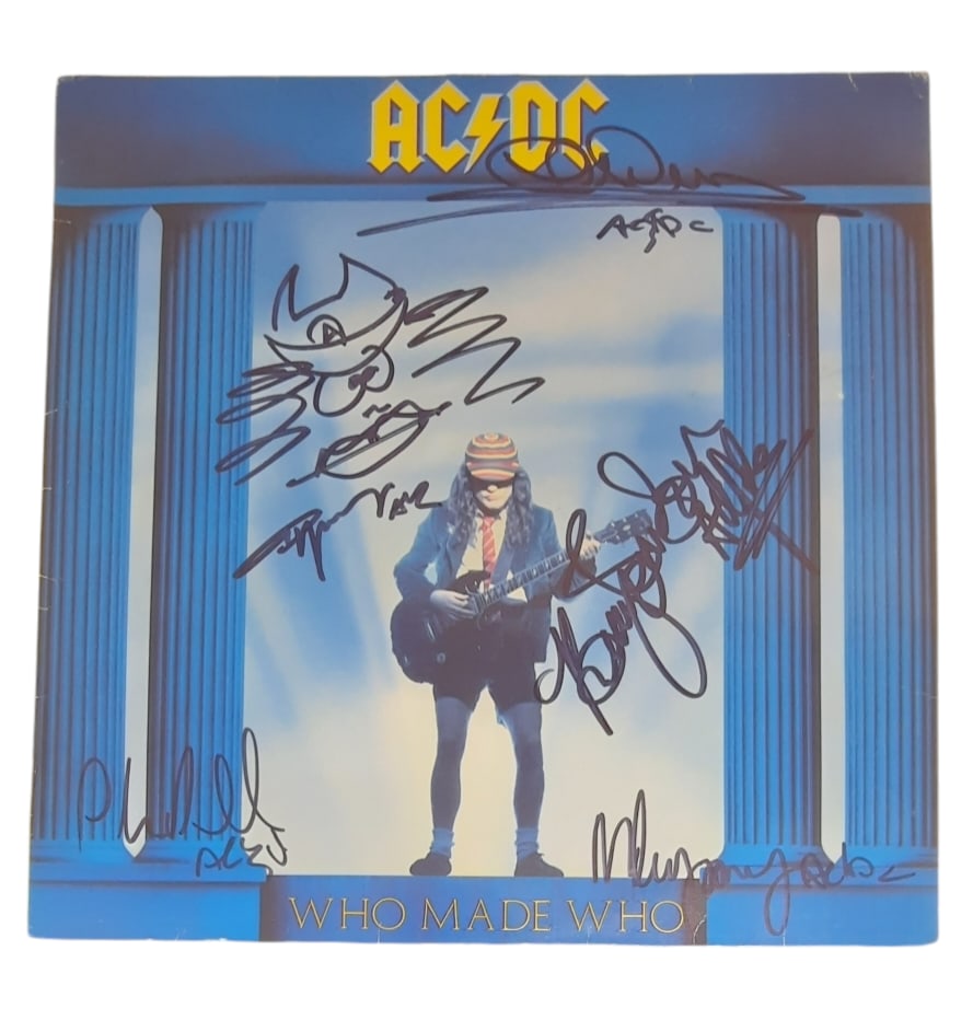 AC/DC Signed Who Made Who Vinyl LP: This lot is a vinyl LP (Who Made Who) autographed by Angus Young, Malcolm Young, Phil Rudd, Brian Johnson and Cliff Williams of AC/DC. Item comes with third-party authentication and affixed tamper-pro