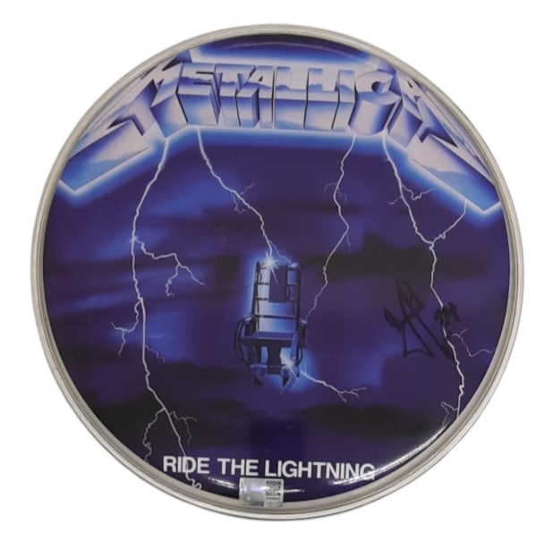 Metallica Signed Drumskin: This lot is a 13.5" signed Ride The Lightning drumskin, autographed by James Hetfield of Metallica. Item comes with third-party authentication and affixed tamper-proof holographic QR sticker leading t