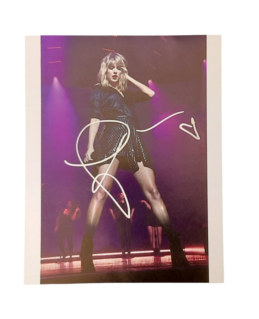 Taylor Swift Signed Photograph: This lot is an 8x10" photograph, autographed by Taylor Swift. Item comes with third-party authentication and affixed tamper-proof holographic QR sticker leading to item details and scoring.