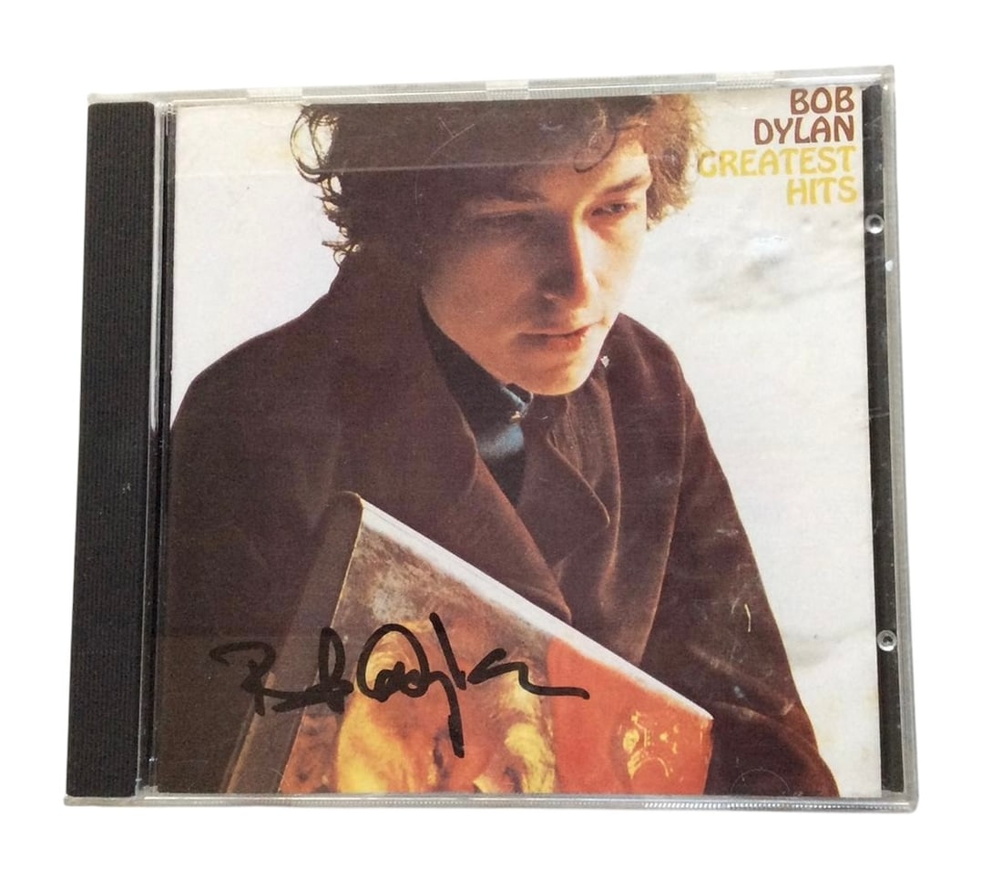 Bob Dylan Signed CD: This lot is a CD (Greatest Hits) autographed by Bob Dylan. Item comes with third-party authentication and affixed tamper-proof holographic QR sticker leading to item details and scoring.