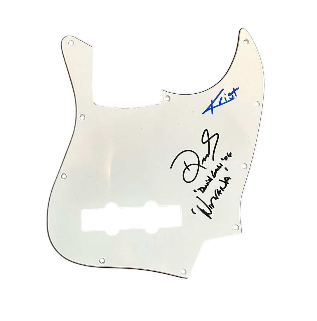 Nirvana Signed Pickguard: This lot is a pickguard, autographed by Dave Grohl and Krist Novoselic of Nirvana. Item comes with third-party authentication and affixed tamper-proof holographic QR sticker leading to item details an