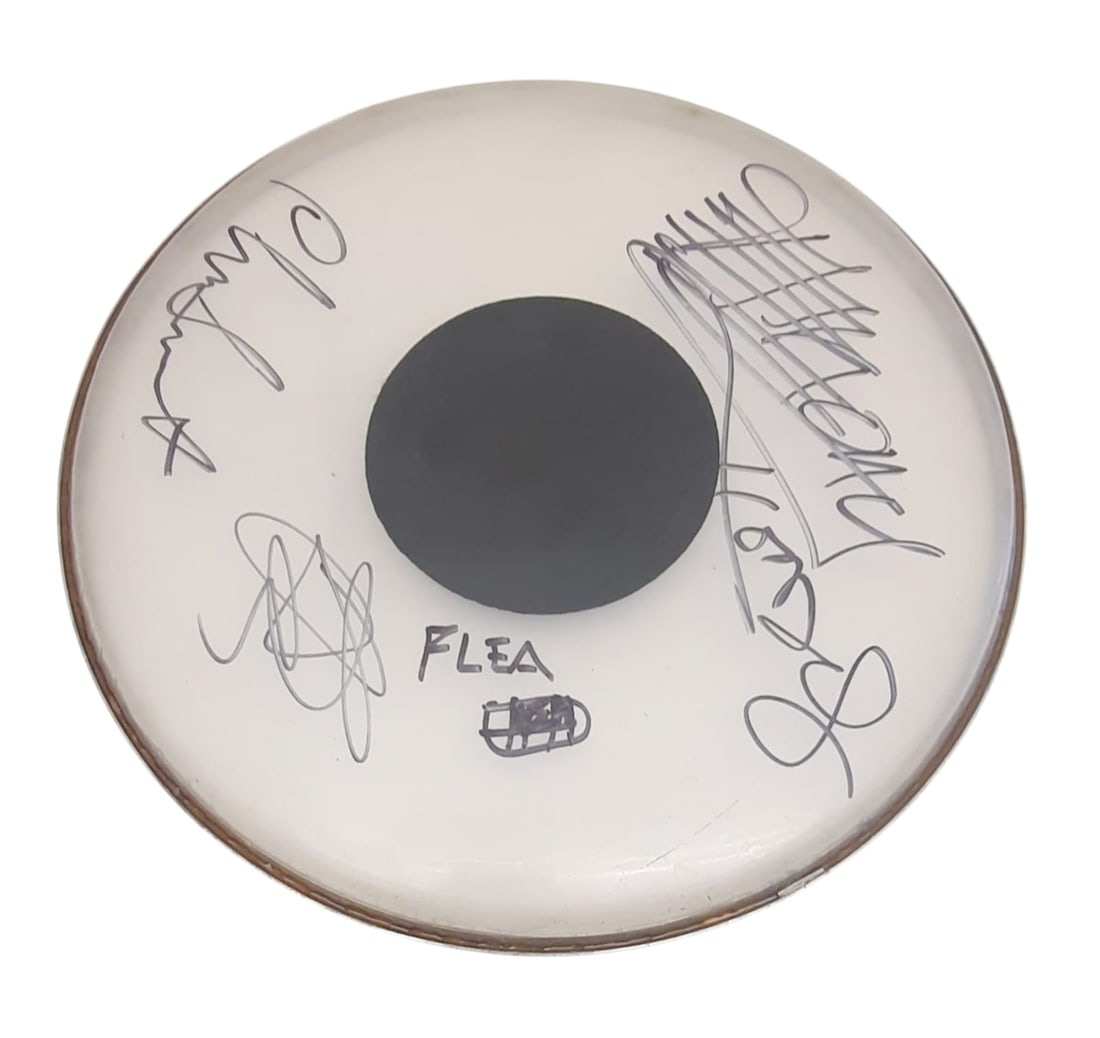 Red Hot Chili Peppers Signed Drumskin: This lot is a 12" drumskin, autographed by Anthony Kiedis, Flea, John Frusciante and Chad Smith of Red Hot Chili Peppers. Item is authenticated by HSA and comes with affixed HSA Tamper-Proof hologram