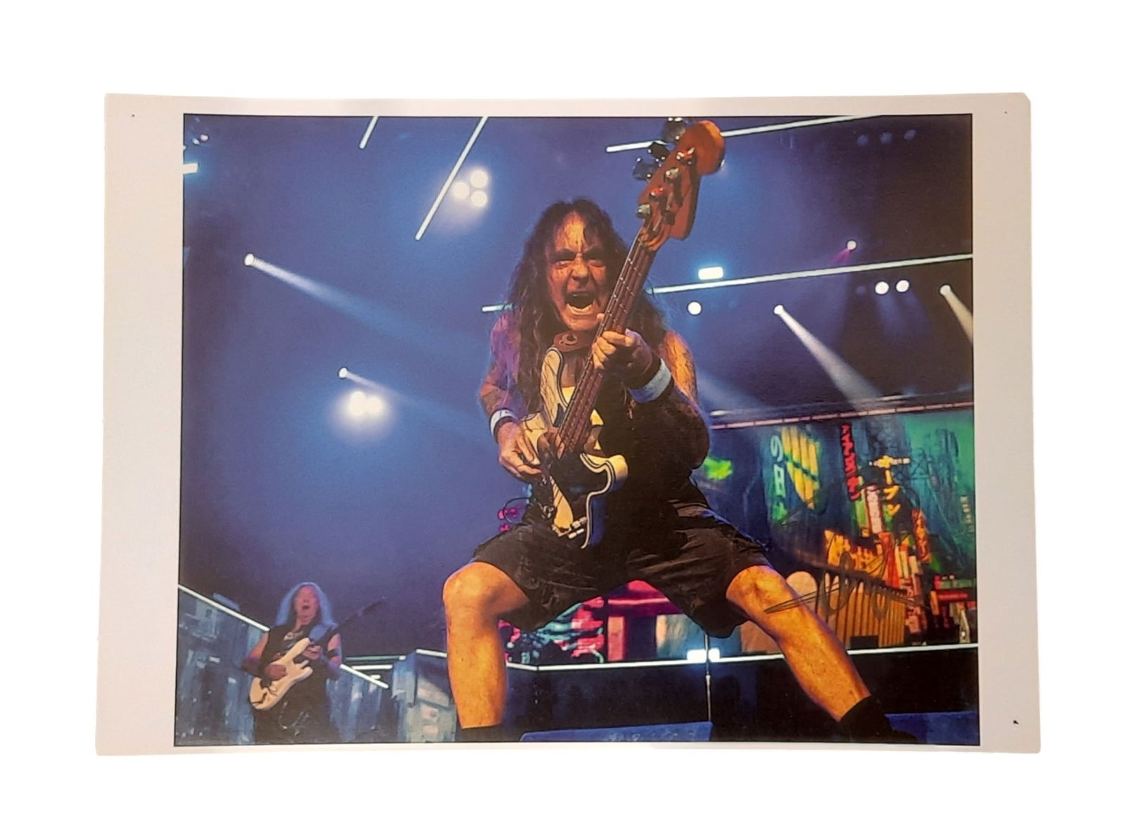 Steve Harris Signed Photograph: This lot is an 11.75x8.25" photograph, autographed by Steve Harris of Iron Maiden. Item comes with third-party authentication and affixed tamper-proof holographic QR sticker leading to item details an