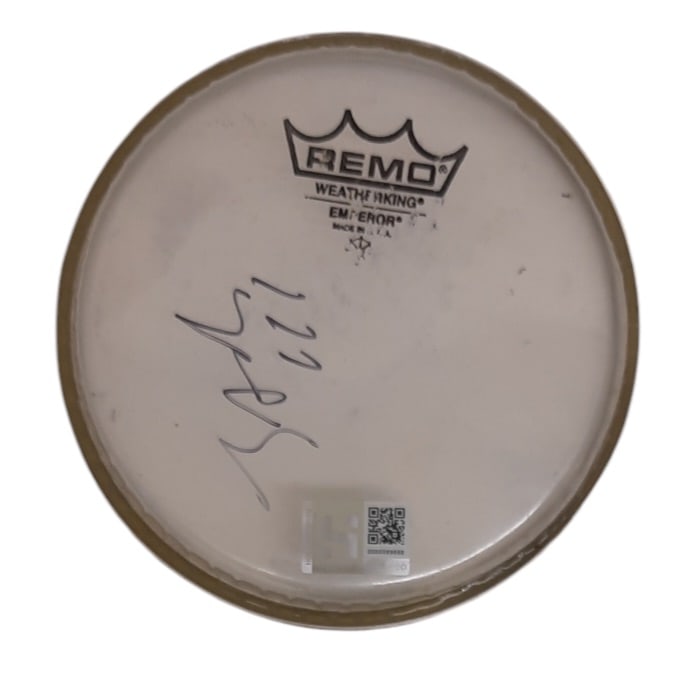 The White Stripes Signed Drumskin: This lot is a 6.5" Remo drumskin, autographed by Jack White of The White Stripes. Item comes with third-party authentication and affixed tamper-proof holographic QR sticker leading to item details and