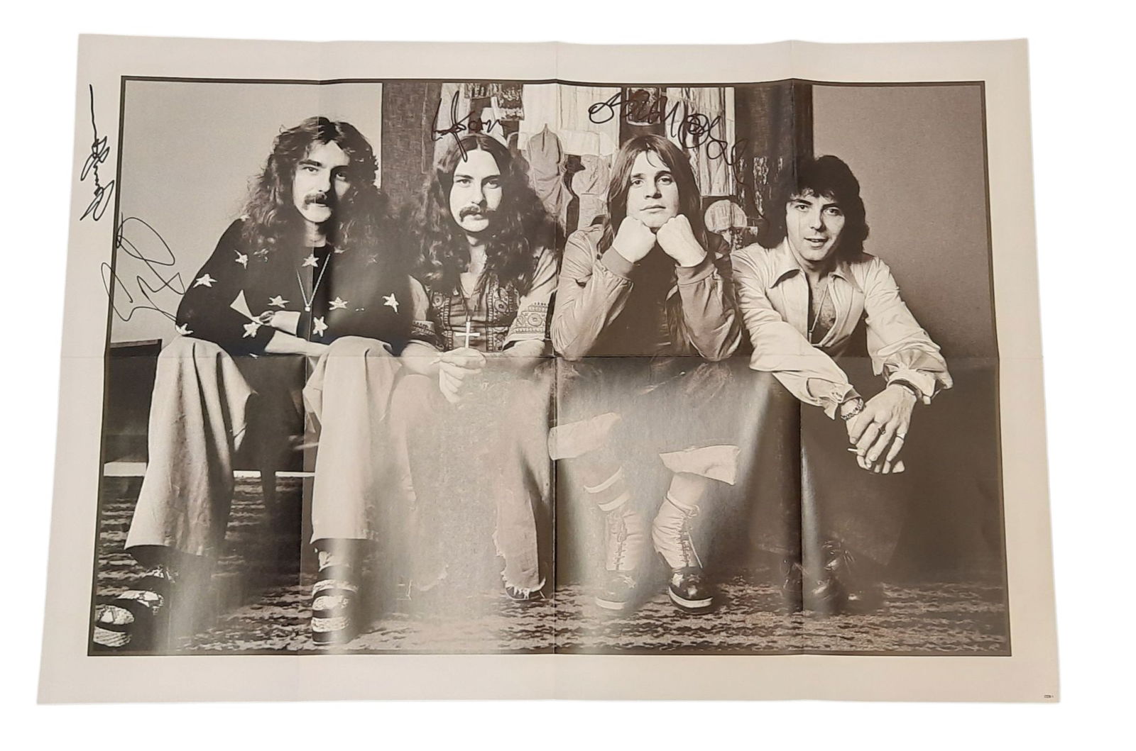 Black Sabbath Signed Original Promotional Poster: This lot is a 27.5x18.75" Black Sabbath original promotional poster, autographed by Ozzy Osbourne, Tony Iommi, Geezer Butler and Bill Ward of Black Sabbath. Item is authenticated by HSA and comes with