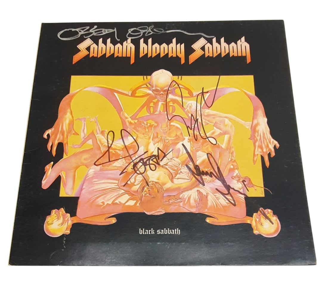 Black Sabbath Signed Vinyl LP: This lot is a vinyl LP (Sabbath Bloody Sabbath), autographed on the front of the vinyl cover by Ozzy Osbourne, Tony Iommi, Geezer Butler and Bill Ward of Black Sabbath. Item is authenticated by HSA an