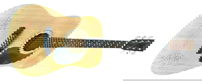 The Who Signed Acoustic Guitar: This lot is an acoustic guitar, autographed on the body by Pete Townshend and Zak Starkey of The Who. Item comes with third-party authentication and affixed tamper-proof holographic QR sticker leading