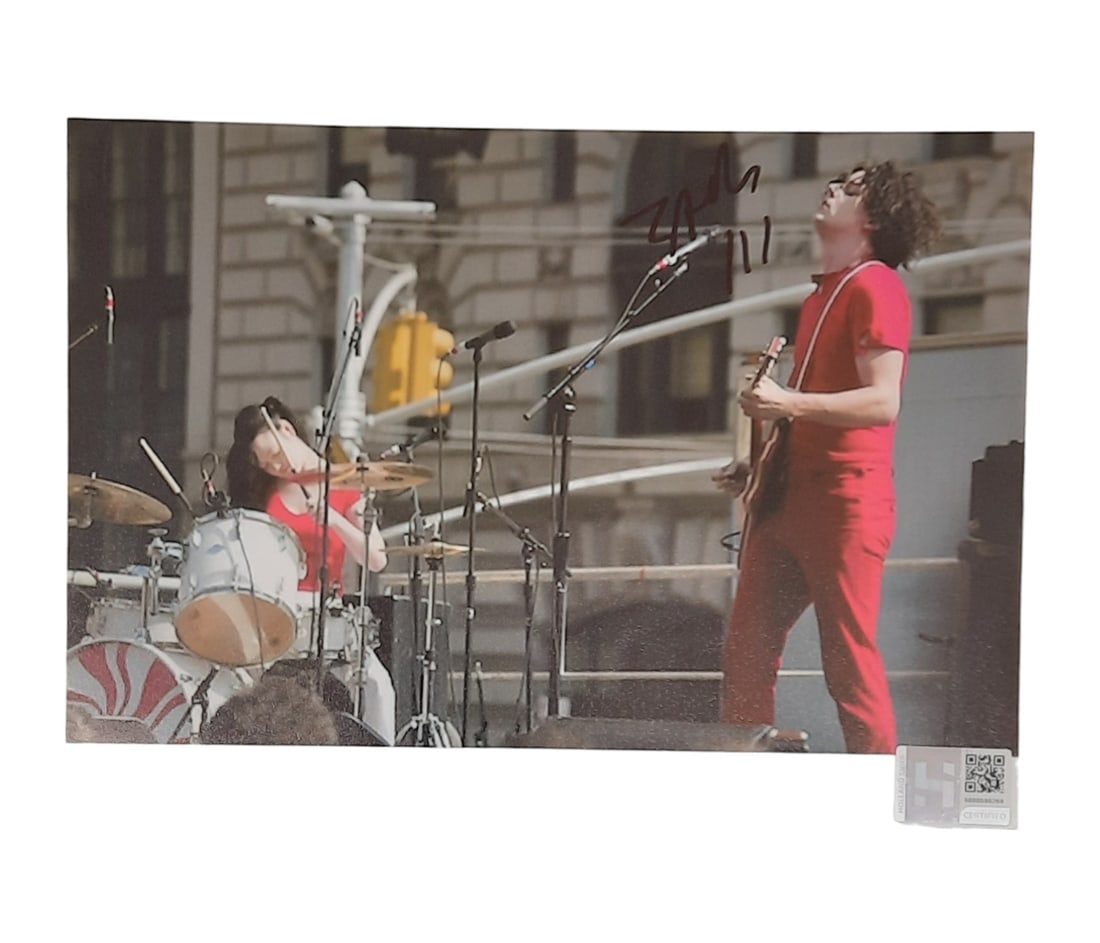 Jack White Signed Photograph: This lot is a 10x8" photograph, autographed by Jack White of The White Stripes. Item comes with third-party authentication and affixed tamper-proof holographic QR sticker leading to item details and s