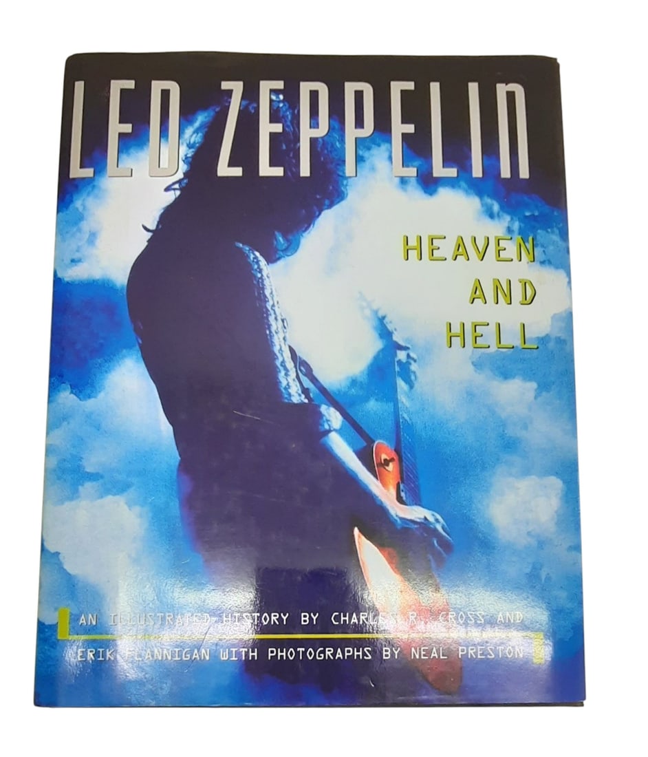 Led Zeppelin Robert Plant Signed Book: This lot is a Led Zeppelin book (Heaven And Hell), autographed on the front inside page by Robert Plant of Led Zeppelin. Item is authenticated by HSA and comes with affixed HSA Tamper-Proof hologram w