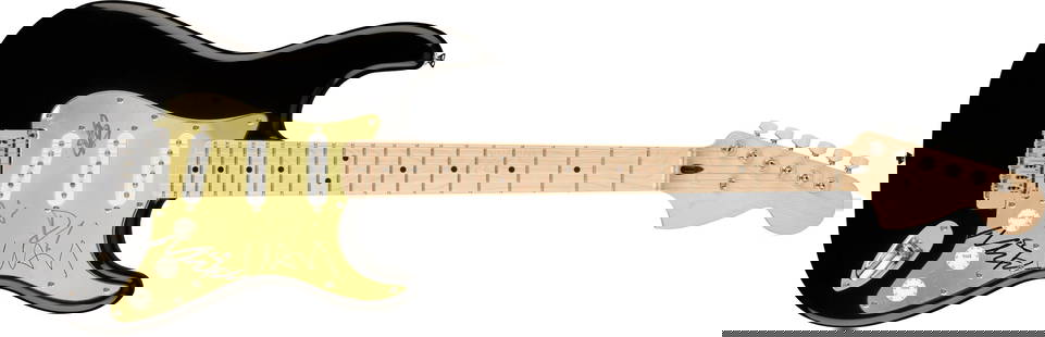 Foo Fighters Signed Electric Guitar: This lot is an electric guitar, autographed on the pickguard by Dave Grohl, Nate Mendel, Pat Smear, Taylor Hawkins and Chris Shiflett of Foo Fighters. Item comes with third-party authentication and af