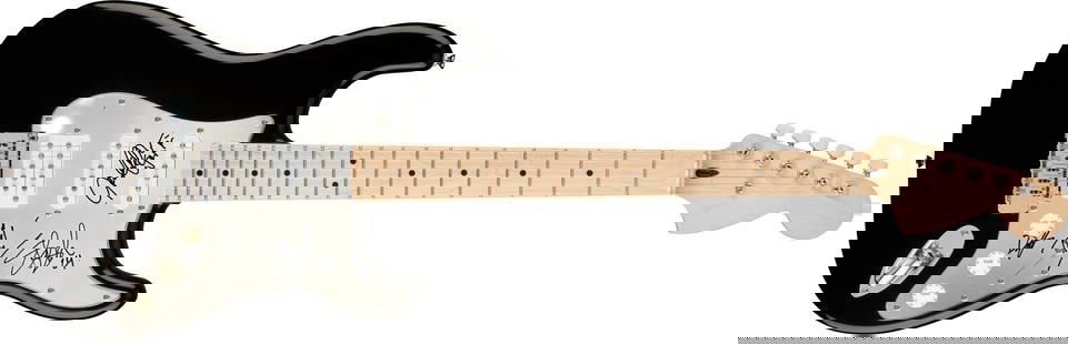 Guns N' Roses Signed Electric Guitar: This lot is an electric guitar, autographed on the pickguard by Axl Rose, Slash, Duff McKagan and Steven Adler of Guns N Roses. Item comes with third-party authentication and affixed tamper-proof holo