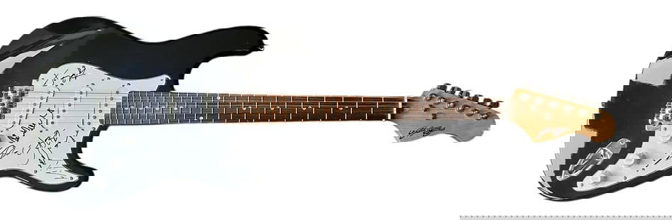 Aerosmith Signed Electric Guitar: This lot is an electric guitar, autographed on the pickguard by Steven Tyler, Joey Kramer, Tom Hamilton, Joe Perry and Brad Whitford of Aerosmith. Item comes with third-party authentication and affixe