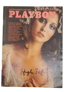 Hugh Hefner Signed February 1975 Playboy Magazine: This lot is a Playboy magazine (February 1975) autographed by Hugh Hefner. Item comes with third-party authentication and affixed tamper-proof holographic QR sticker leading to item details and scorin