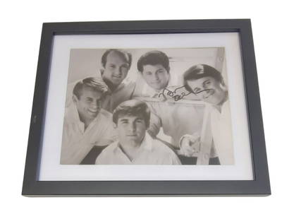 Brian Wilson Beach Boys Signed Framed Photograph: This lot is a framed 10x8" photograph, autographed by Brian Wilson of the Beach Boys. The photo is housed within a mounted black wooden frame, an ideal display item for collectors. Item comes with thi