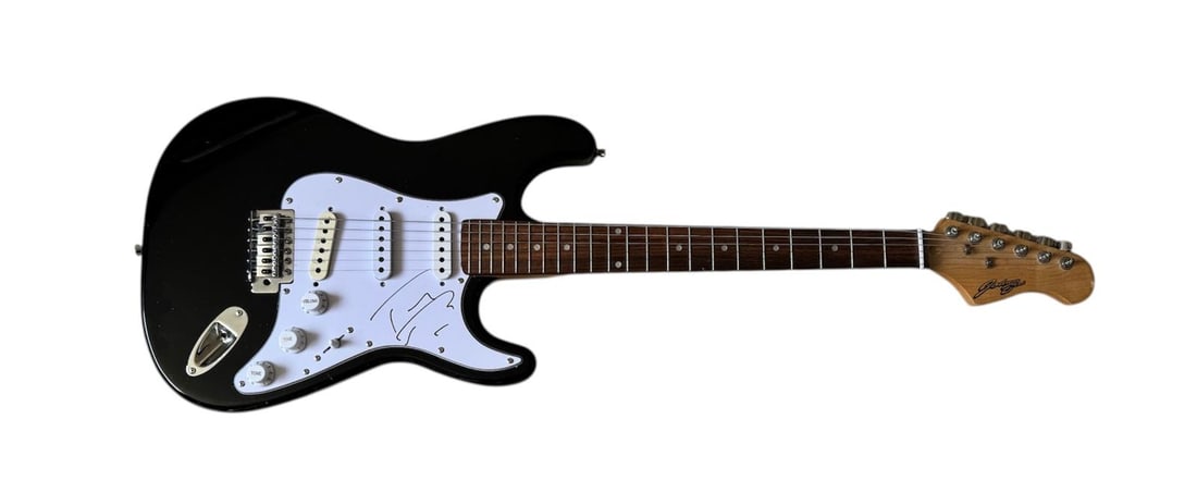 Tom Petty Signed Electric Guitar: This lot is an electric guitar, autographed on the pickguard by Tom Petty. Item comes with third-party authentication and affixed tamper-proof holographic QR sticker leading to item details and scorin
