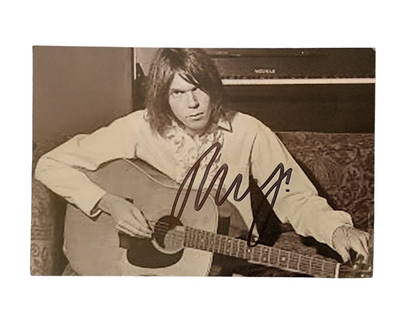 Neil Young Signed Photograph: This lot is a 6x4" photograph, autographed by Neil Young. Item comes with third-party authentication and affixed tamper-proof holographic QR sticker leading to item details and scoring.