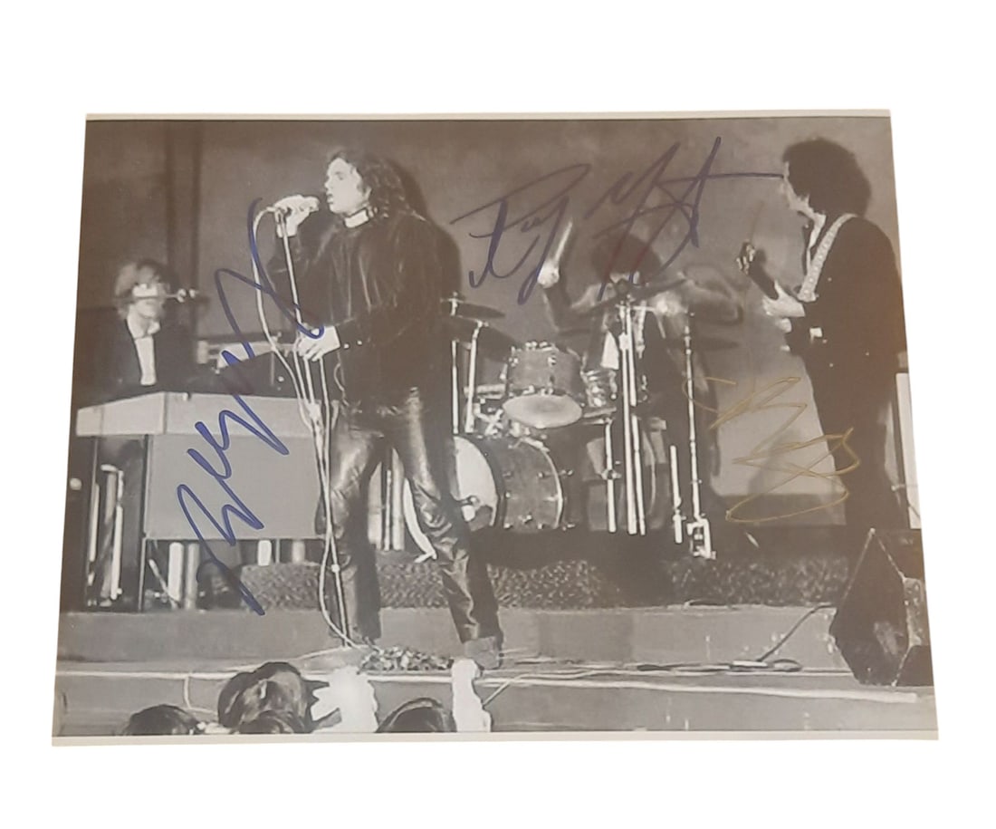 The Doors Signed Photograph: This lot is a 10x8" photograph, autographed by Ray Manzarek and Robby Kreiger of The Doors. Item comes with third-party authentication and affixed tamper-proof holographic QR sticker leading to item d