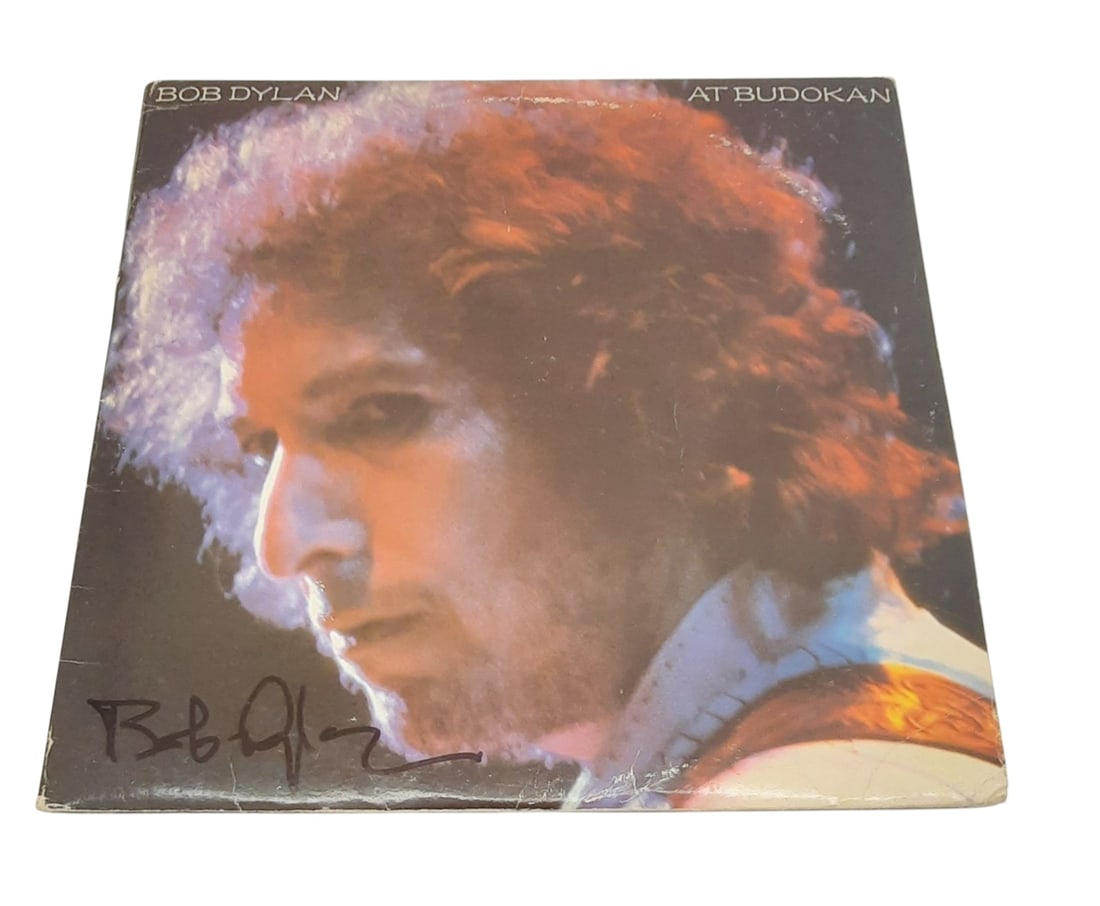 Bob Dylan Signed Vinyl LP: This lot is a vinyl LP (At Budokan), autographed on the front of the vinyl cover by Bob Dylan. Item is authenticated by HSA and comes with affixed HSA Tamper-Proof hologram with interactive QR code, c