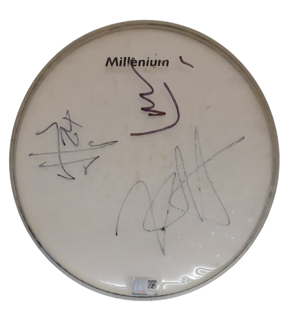 Metallica Signed Drumskin: This lot is a 12.5" Millenium drumskin, autographed by James Hetfield, Lars Ulrich and Kirk Hammett of Metallica. Item comes with third-party authentication and affixed tamper-proof holographic QR sti
