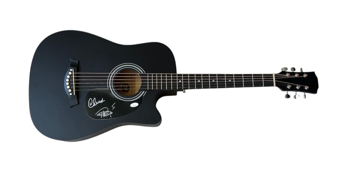 Cheece And Chong Signed Acoustic Guitar: This lot is an acoustic guitar, autographed on the plate by Cheece and Chong. Item comes with JSA authentication.