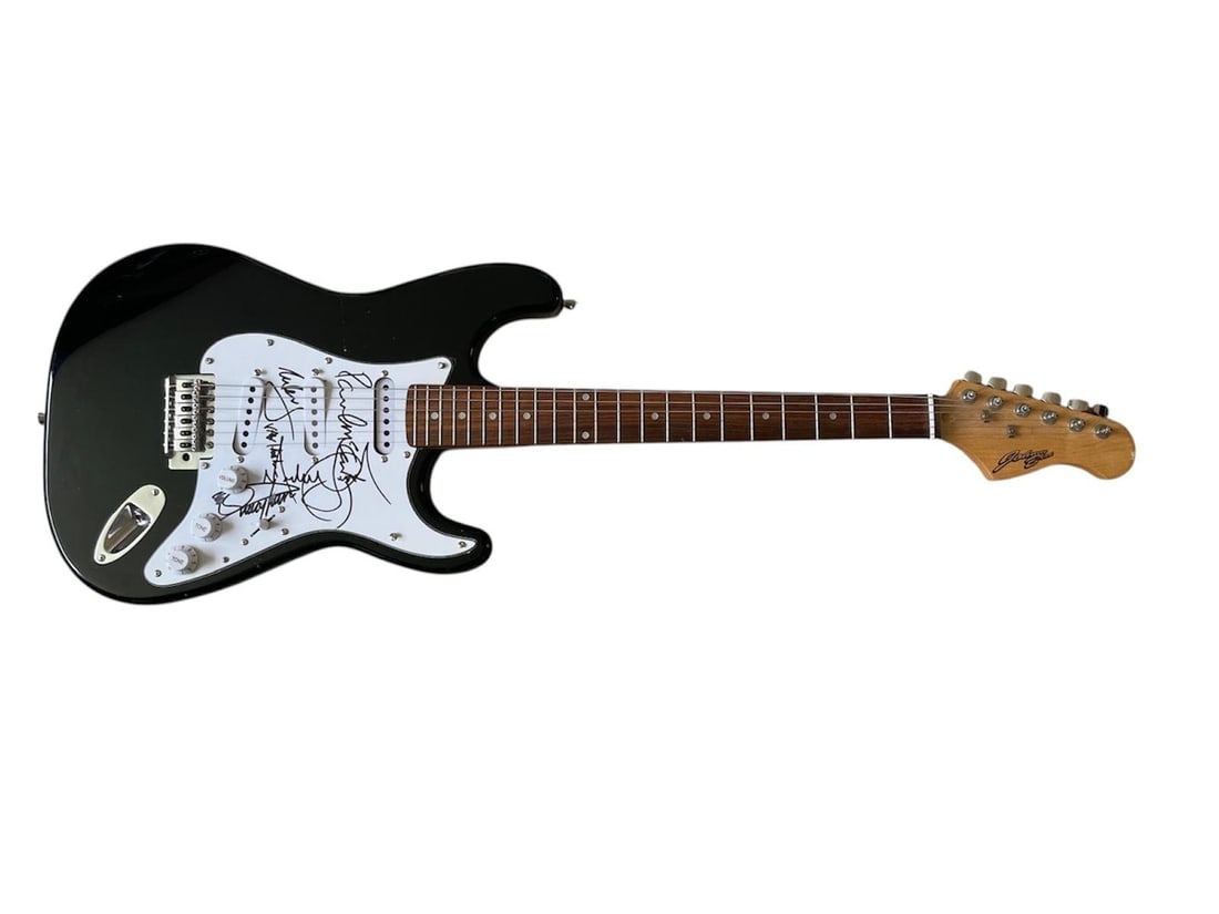 Michael Jackson And Paul McCartney Thriller Signed Electric Guitar: This lot is a thriller electric guitar, autographed on the pickguard by Michael Jackson, Paul McCartney, Eddie Van Halen and Quincy Jones. Item comes with third-party authentication and affixed tamper