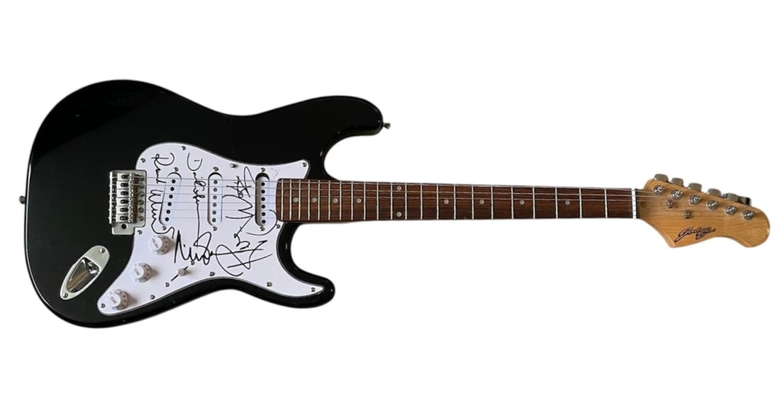 Pink Floyd Signed Electric Guitar: This lot is an electric guitar, autographed on the pickguard by Roger Waters, Nick Mason, David Gilmour and Richard Wright of Pink Floyd. Item comes with third-party authentication and affixed tamper-