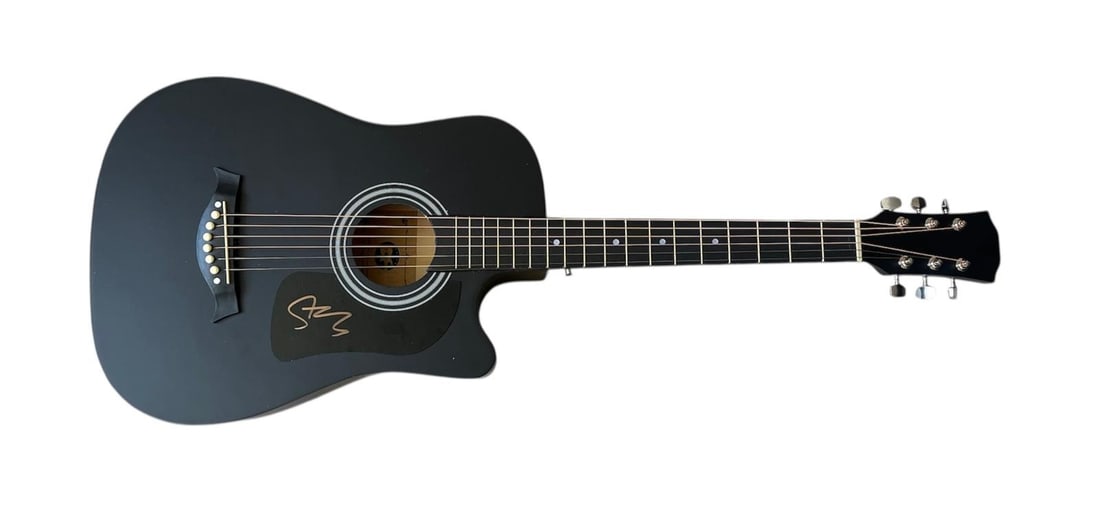 The Police Sting Signed Acoustic Guitar: This lot is an acoustic guitar, autographed on the plate by Sting of The Police. Item comes with third-party authentication and affixed tamper-proof holographic QR sticker leading to item details and